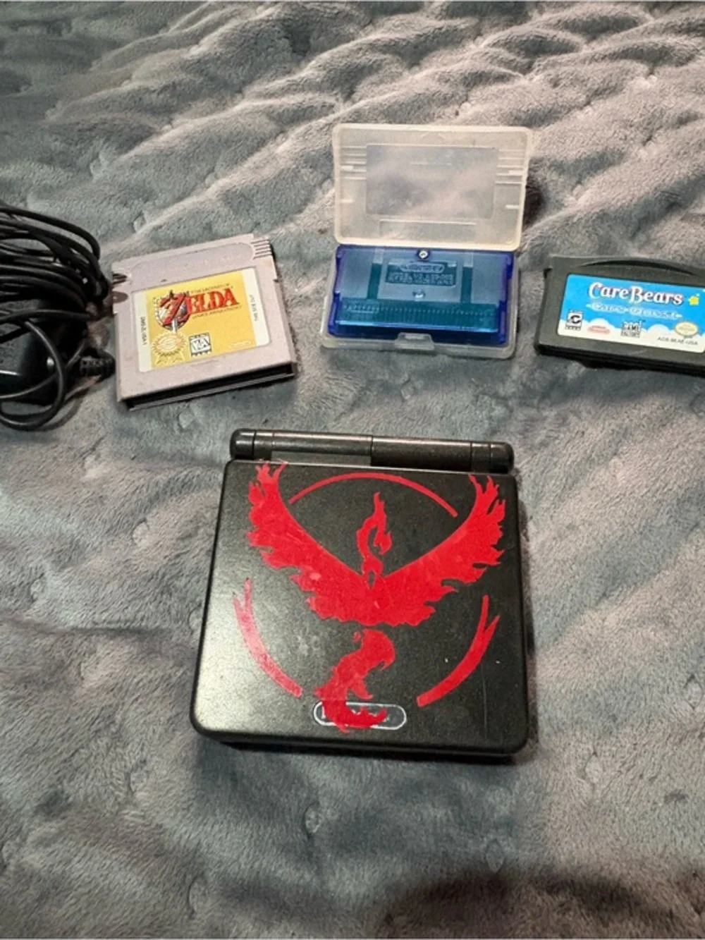 Nintendo Game Boy Advance SP Black with Pokémon sapphire, Zelda, Care Bears